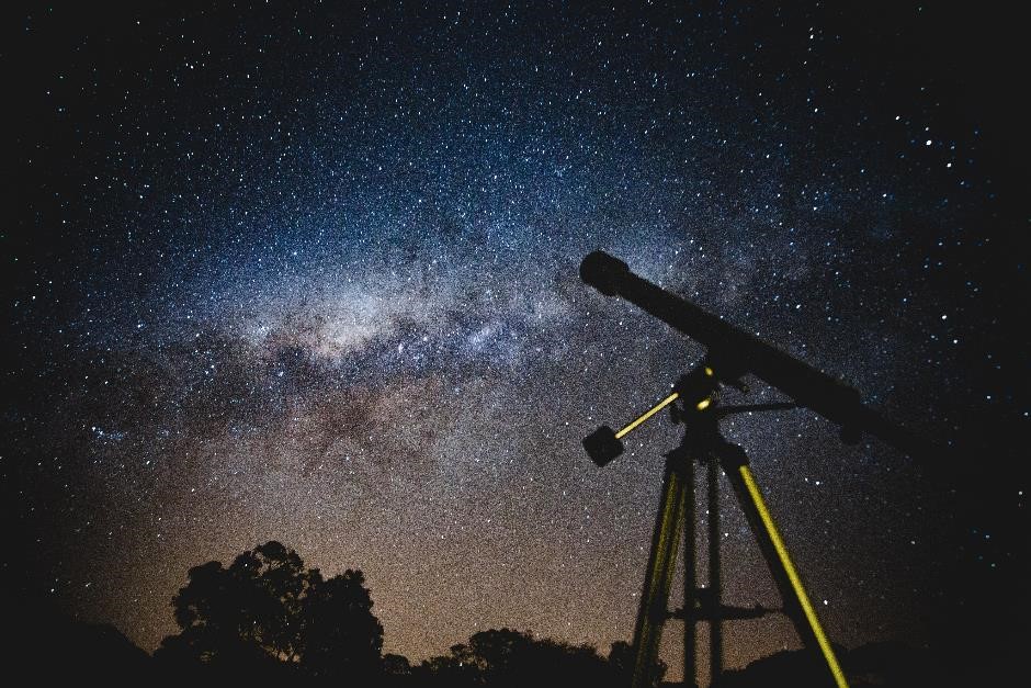 Telescope pointed towards the night sky