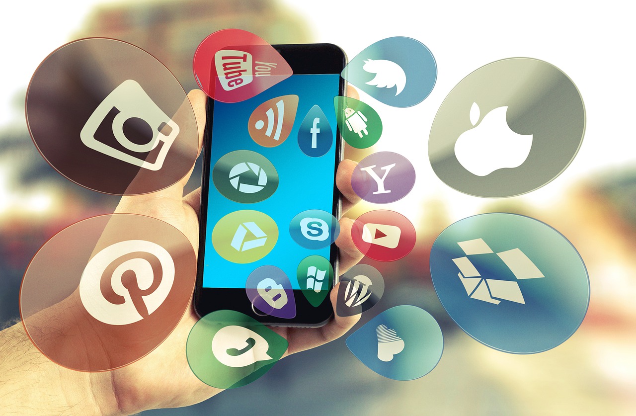 Image of a phone and social media icons
