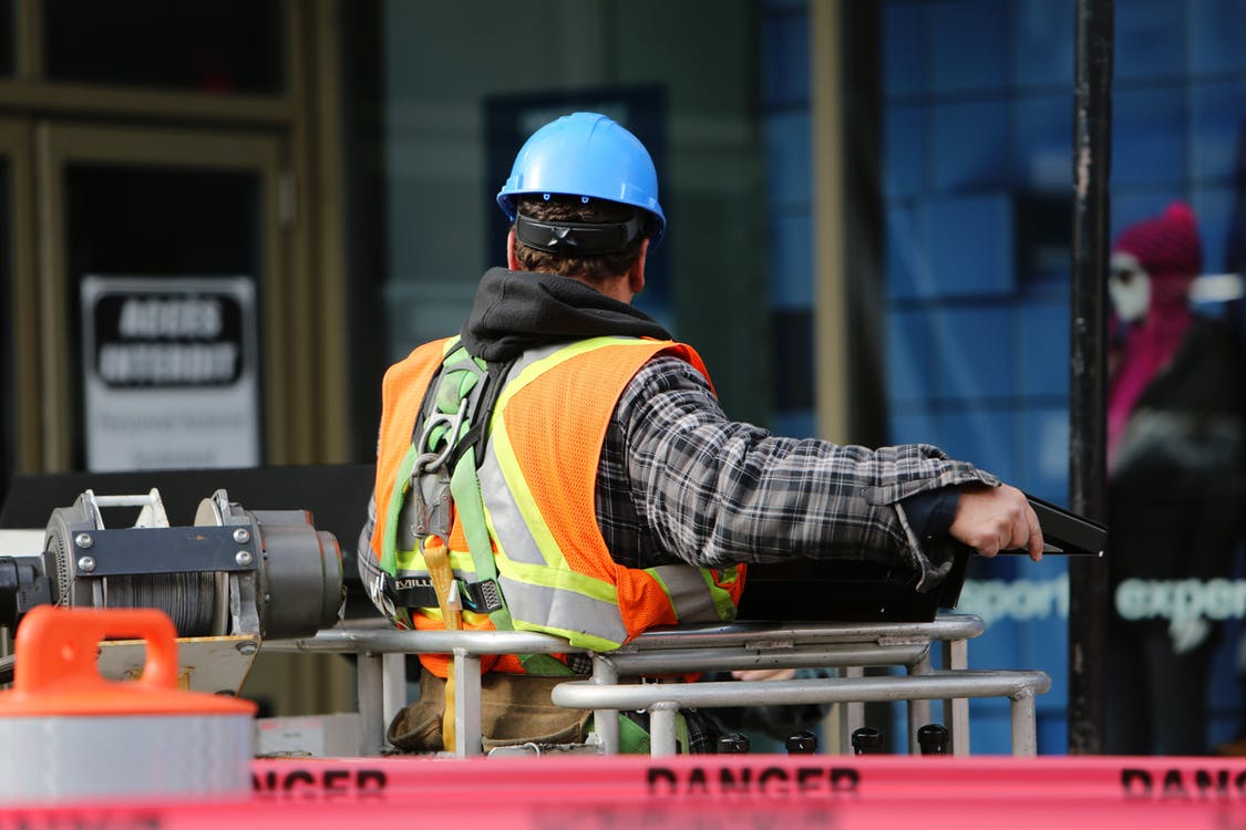 Workman wearing safety equipment 