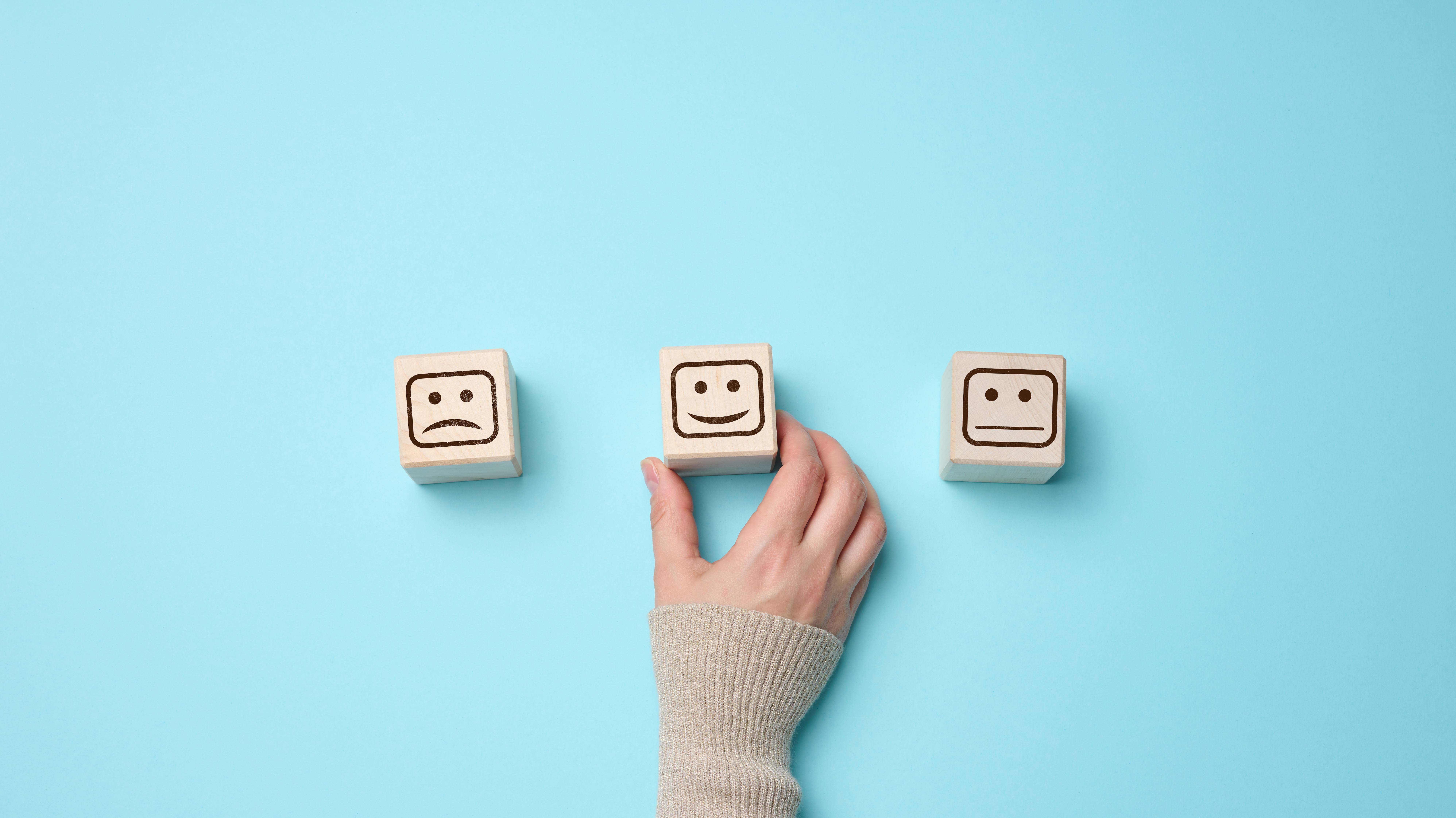 Blocks showing faces expressing different emotions